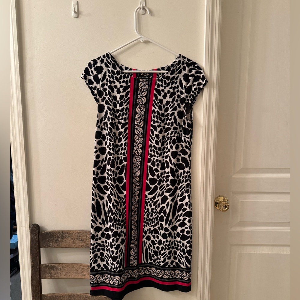 Leopard print dress with colorful accent.